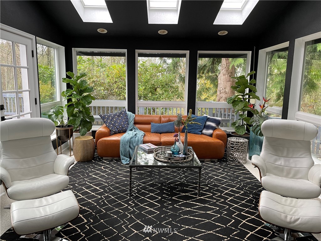 718 222nd Street Southwest Bothell, WA 98021 - Photo 7 of 22 a living room with furniture and a floor to ceiling window