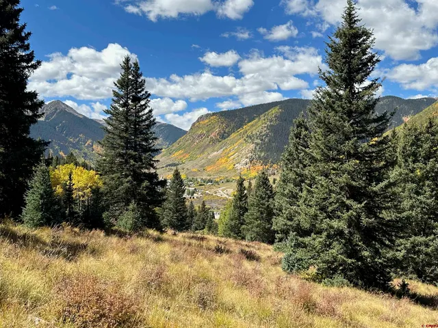 a view of a street with an ocean view
