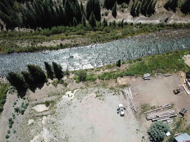 a view of a street with a yard