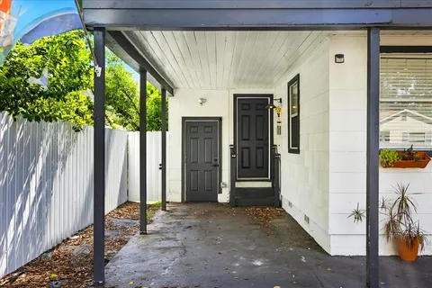 a view of a back yard from a room