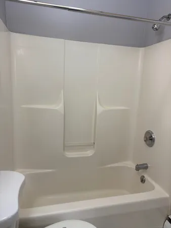 a bathroom with a bathtub