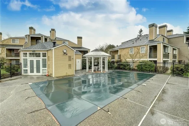 a front view of a house with swimming pool