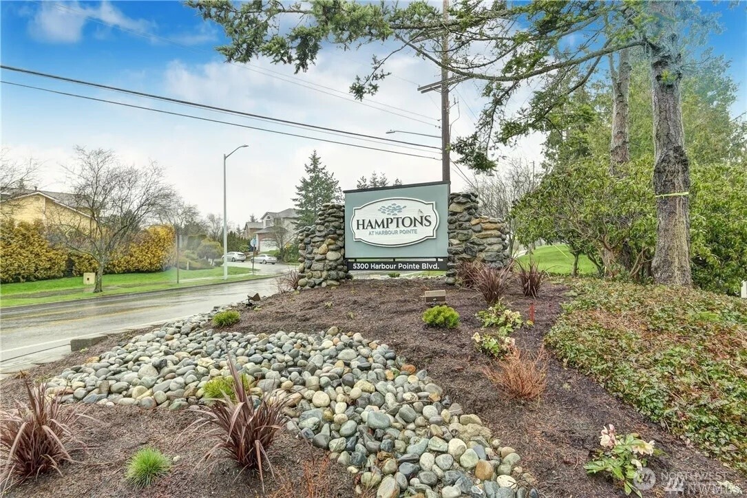5300 Harbour Pointe Boulevard, Unit 304C Mukilteo, WA 98275 - Photo 19 of 19 a sign that is on the side of a road