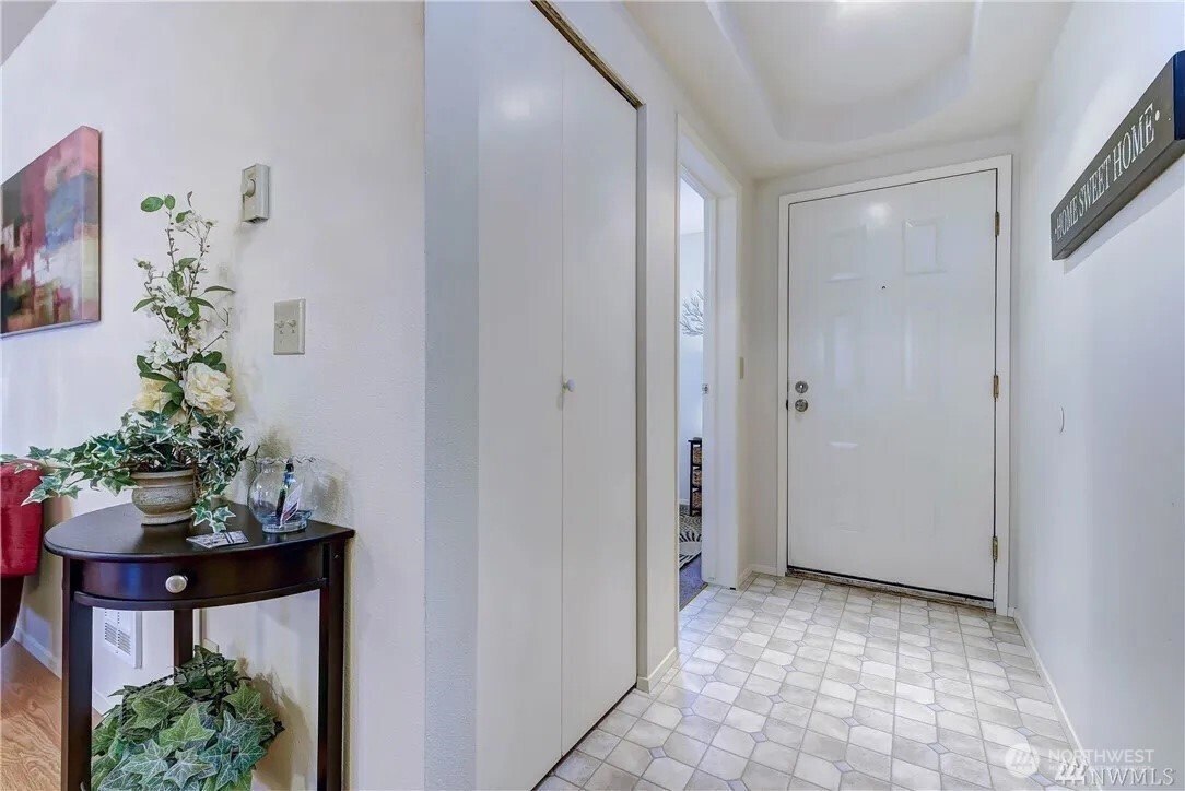 5300 Harbour Pointe Boulevard, Unit 304C Mukilteo, WA 98275 - Photo 3 of 19 a view of entryway with kitchen and dining room