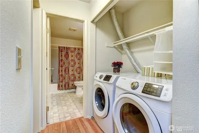 a view of washer and dryer in a utility room