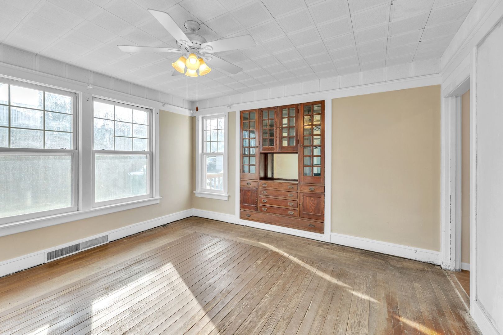 710 North 7th Street Rochelle, IL 61068 - Photo 7 of 32 a view of an empty room with a window