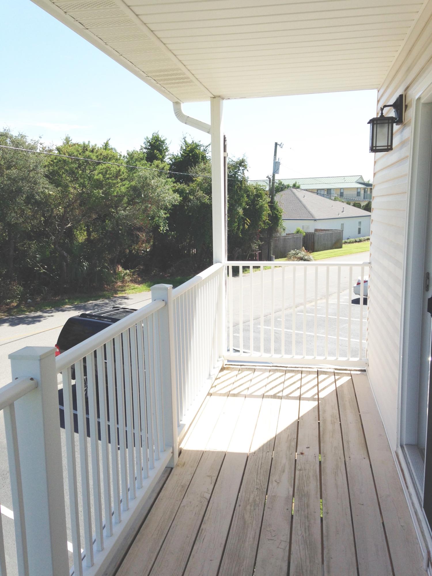 241 Ellis Road, Unit 6 Miramar Beach, FL 32550 - Photo 20 of 30 a view of balcony with wooden floor