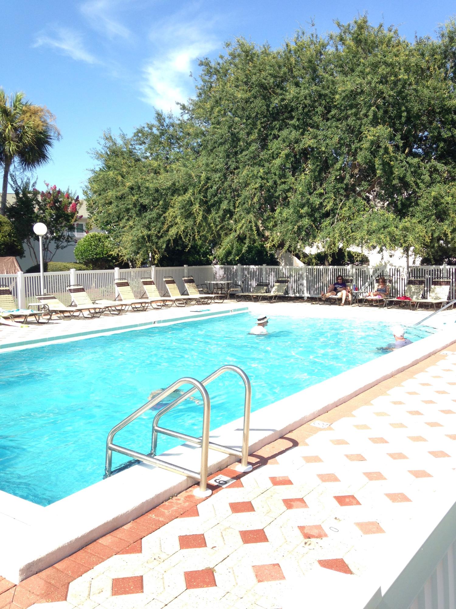 241 Ellis Road, Unit 6 Miramar Beach, FL 32550 - Photo 25 of 30 a swimming pool with an outdoor space and seating area