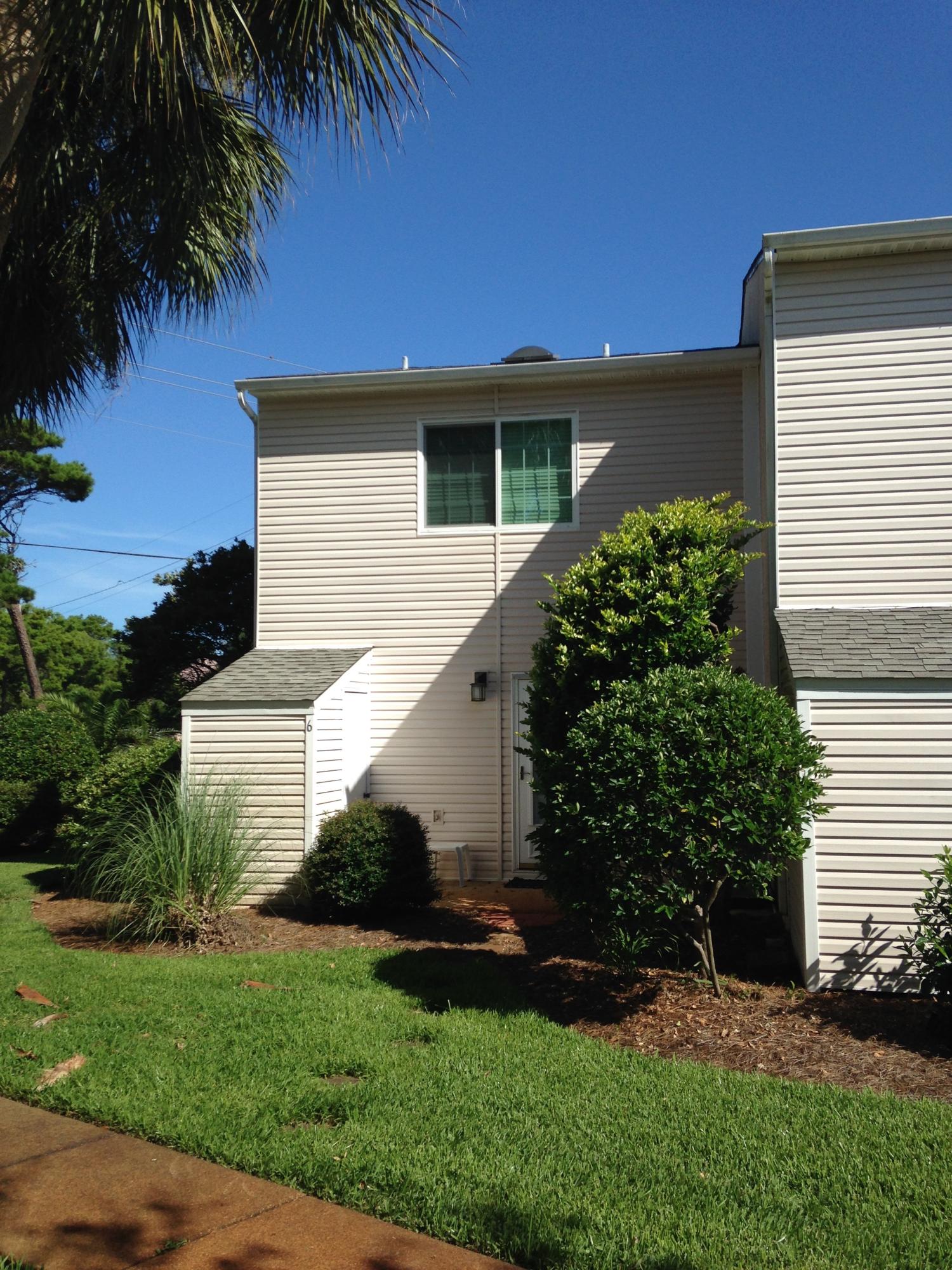 241 Ellis Road, Unit 6 Miramar Beach, FL 32550 - Photo 26 of 30 a view of a house with a yard