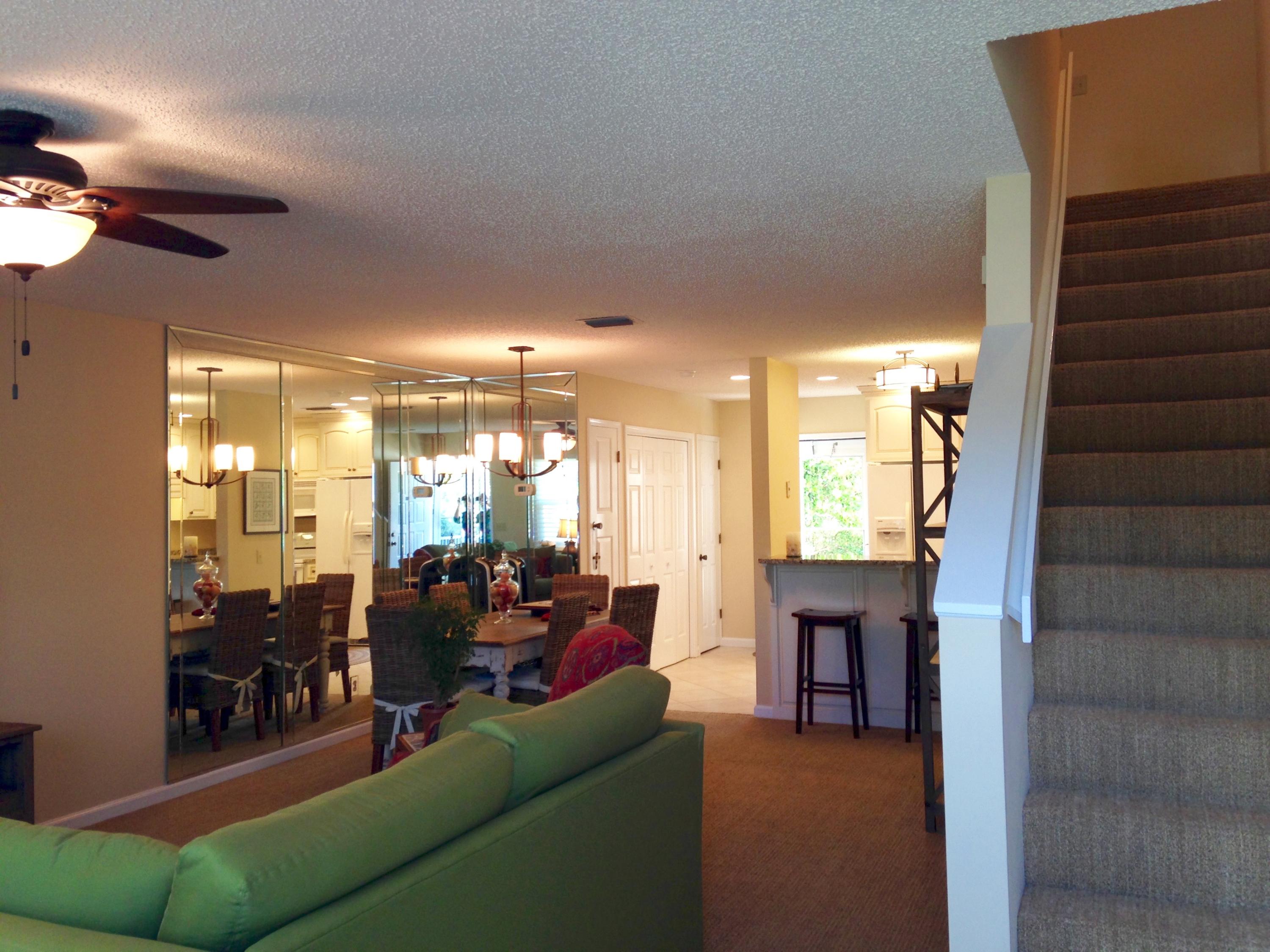 241 Ellis Road, Unit 6 Miramar Beach, FL 32550 - Photo 3 of 30 a living room with furniture kitchen view and a large window