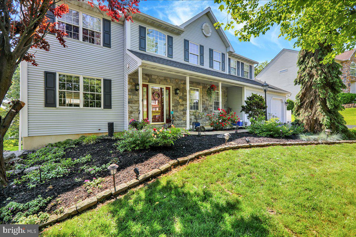 29 Colorado Avenue Sinking Spring, PA 19608 - Photo 1 of 40 a front view of a house with swimming pool and porch