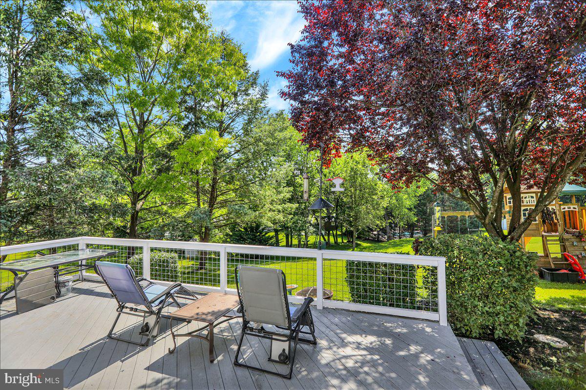 29 Colorado Avenue Sinking Spring, PA 19608 - Photo 33 of 40 a view of a chair and table on the deck