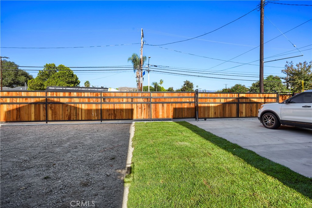 11531 Dronfield Avenue Pacoima, CA 91331 - Photo 12 of 12 a view of a backyard with seating area and barbeque oven