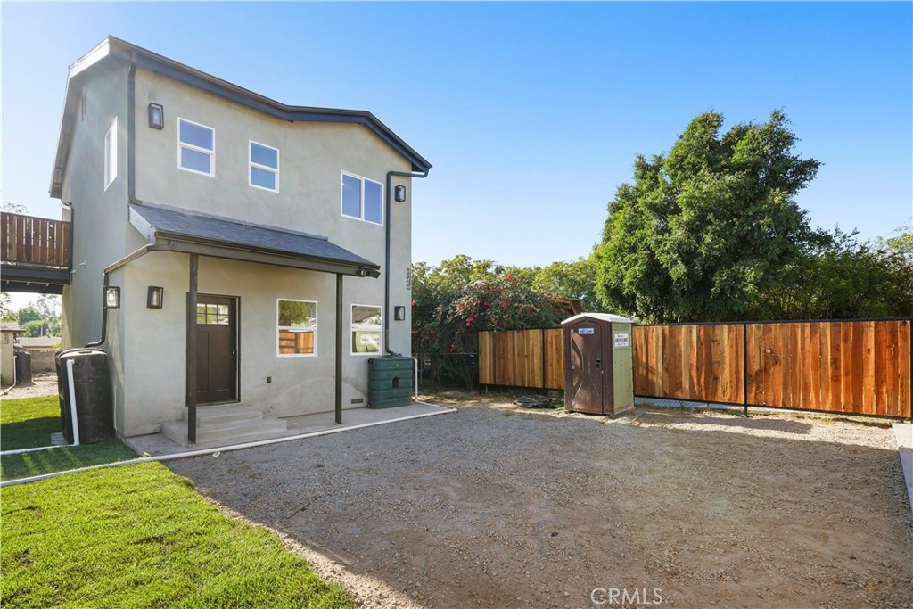 11531 Dronfield Avenue Pacoima, CA 91331 - Photo 3 of 12 a view of a house with wooden fence