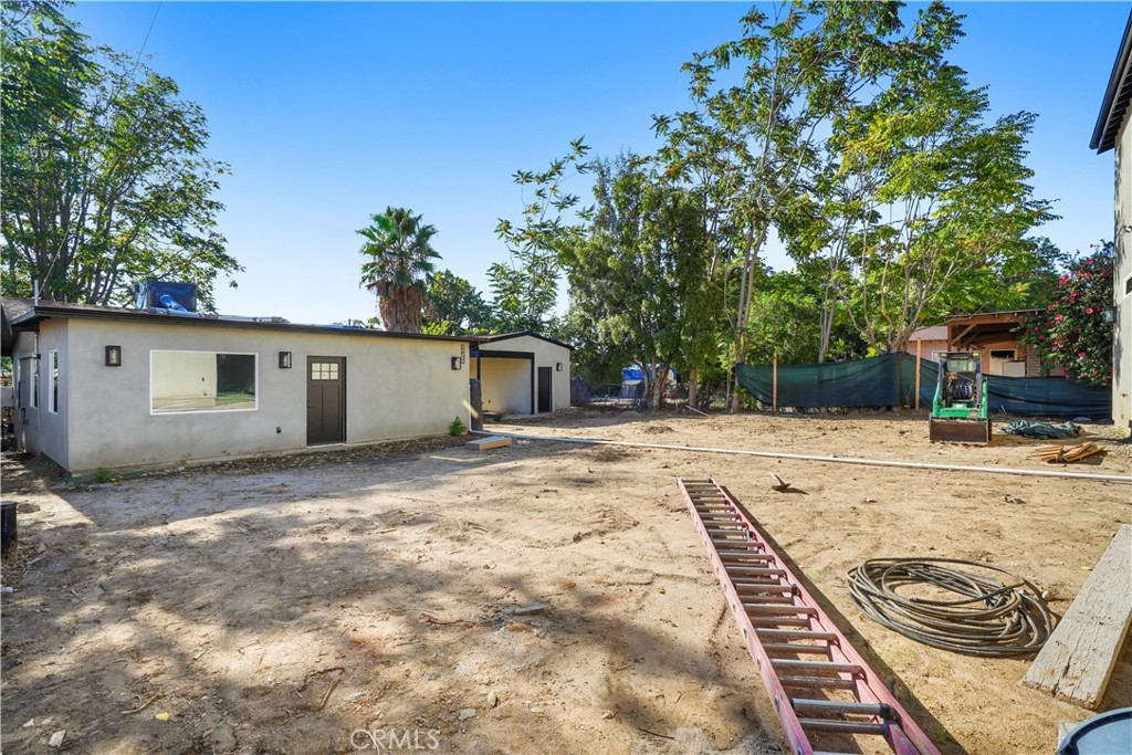 11531 Dronfield Avenue Pacoima, CA 91331 - Photo 4 of 12 a house view with a backyard space