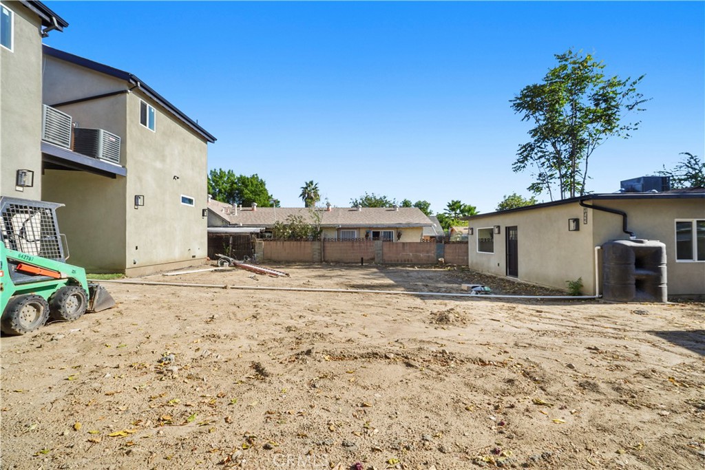 11531 Dronfield Avenue Pacoima, CA 91331 - Photo 5 of 12 a view of a house with wooden fence