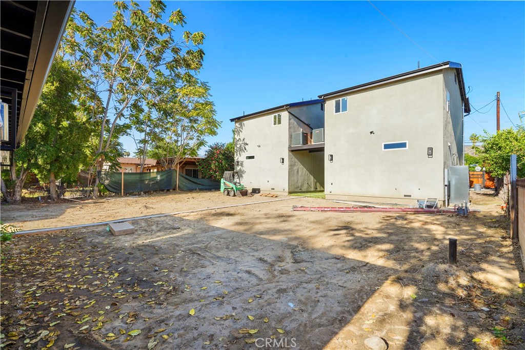 11531 Dronfield Avenue Pacoima, CA 91331 - Photo 10 of 12 a view of a house with a yard