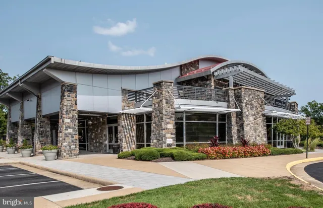 a room with a table and chairs