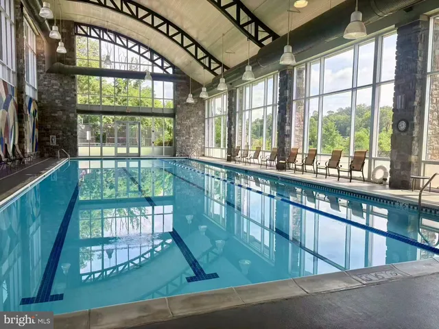 a view of a wrought iron fences in front of house