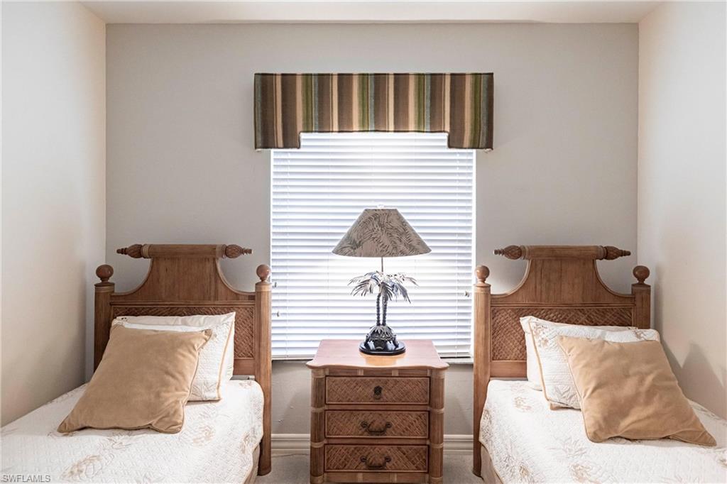 451 Bayfront Place, Unit 5309 Naples, FL 34102 - Photo 22 of 33 Bedroom with carpet