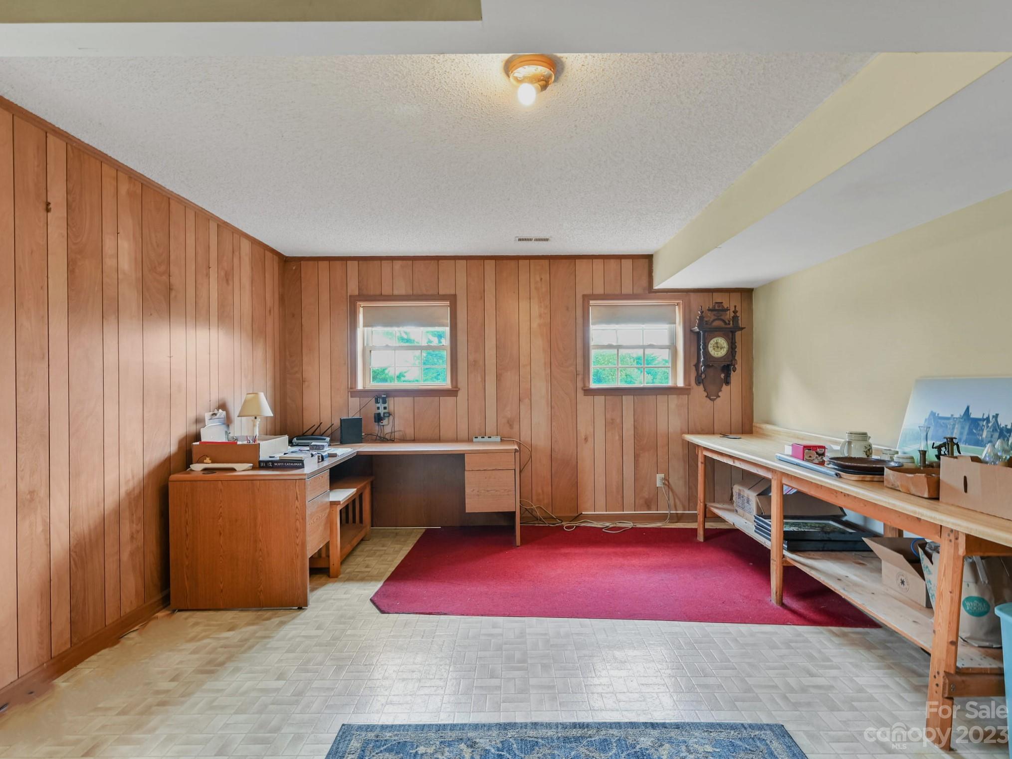 386 Heather Downs Drive Alexander, NC 28701 - Photo 18 of 29 a kitchen with stainless steel appliances granite countertop a stove a sink dishwasher and a dining table with chairs