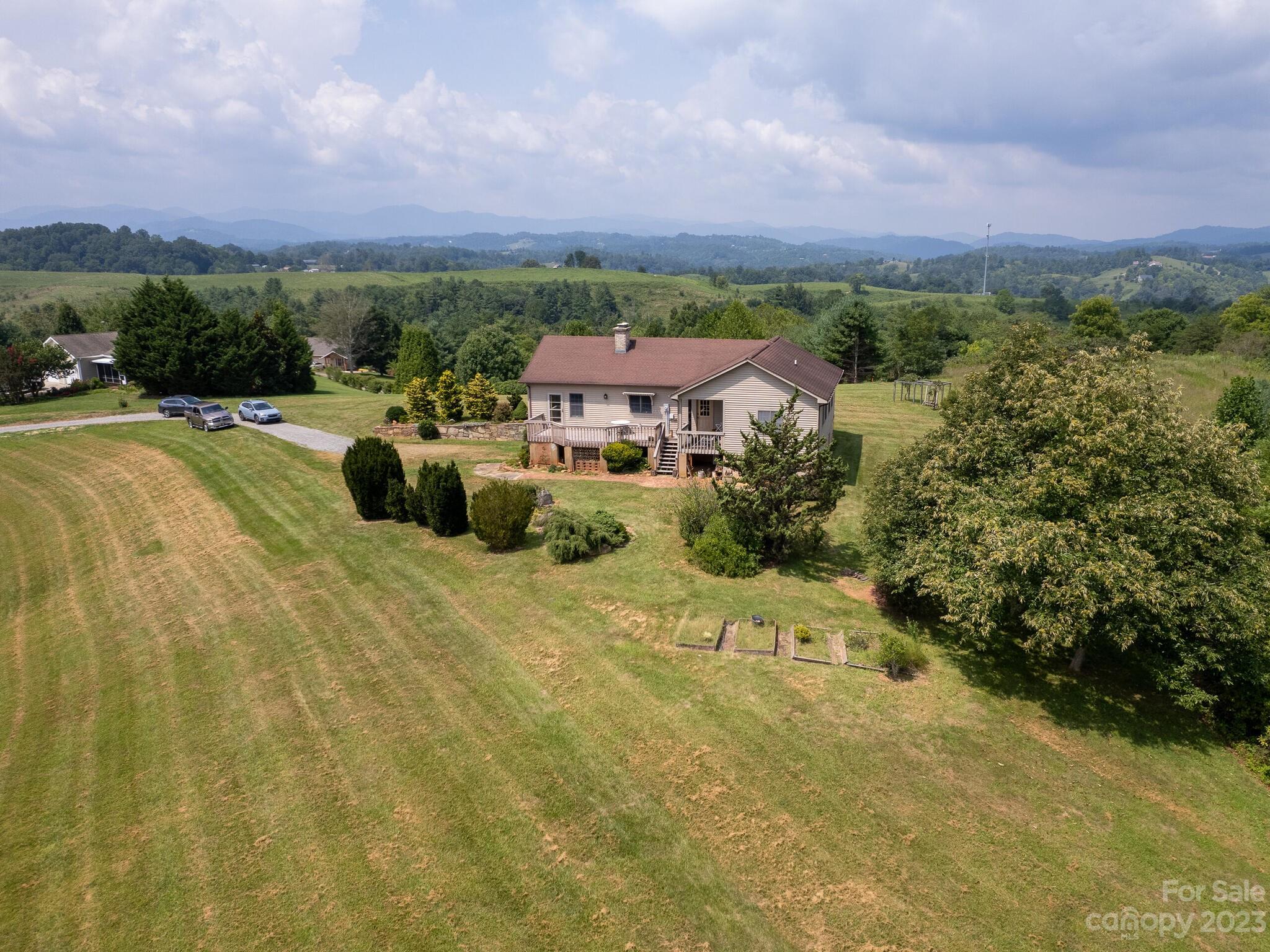 386 Heather Downs Drive Alexander, NC 28701 - Photo 4 of 29 a view of a city with tall buildings
