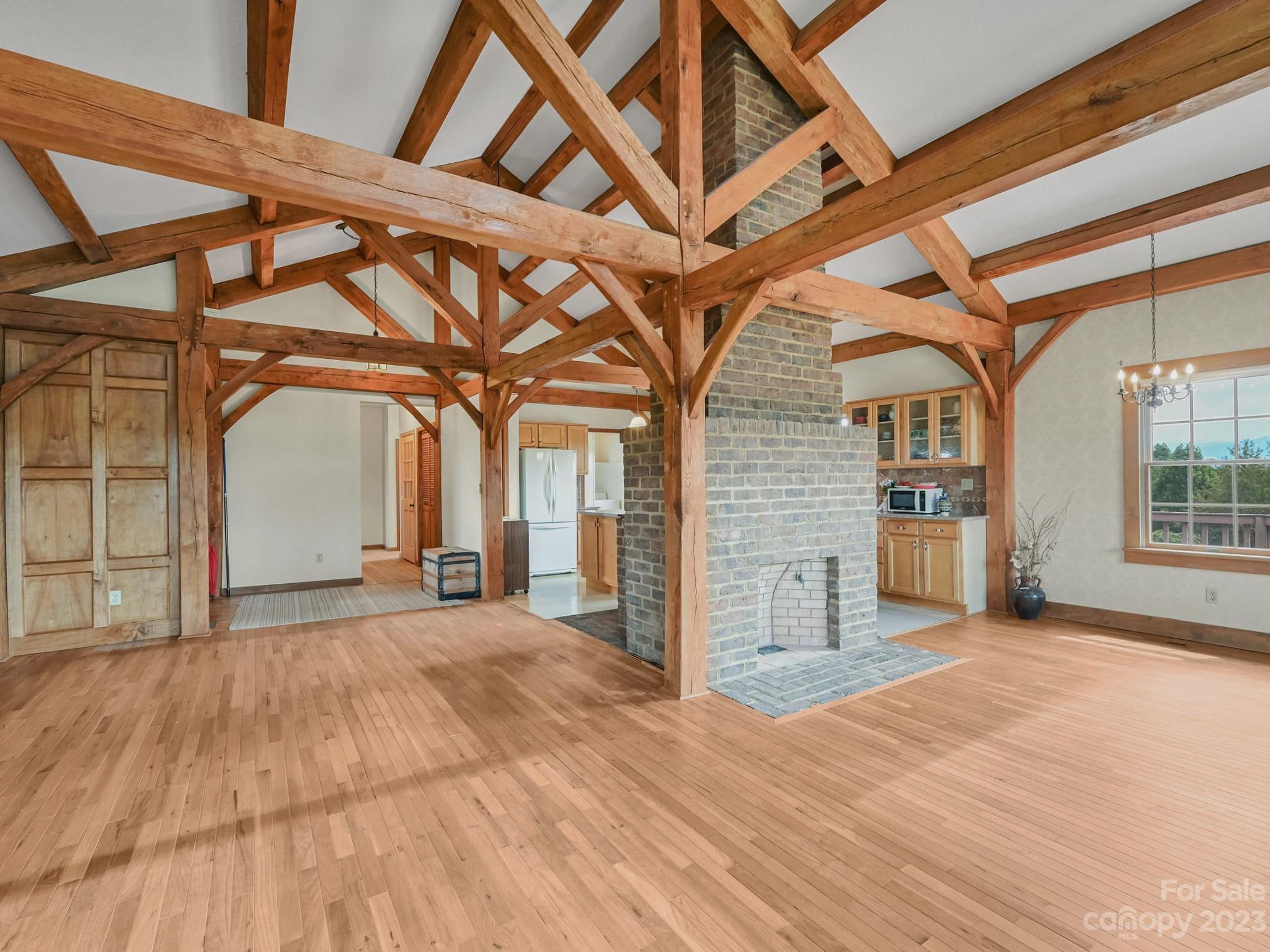 386 Heather Downs Drive Alexander, NC 28701 - Photo 5 of 29 a view of a room with wooden floor
