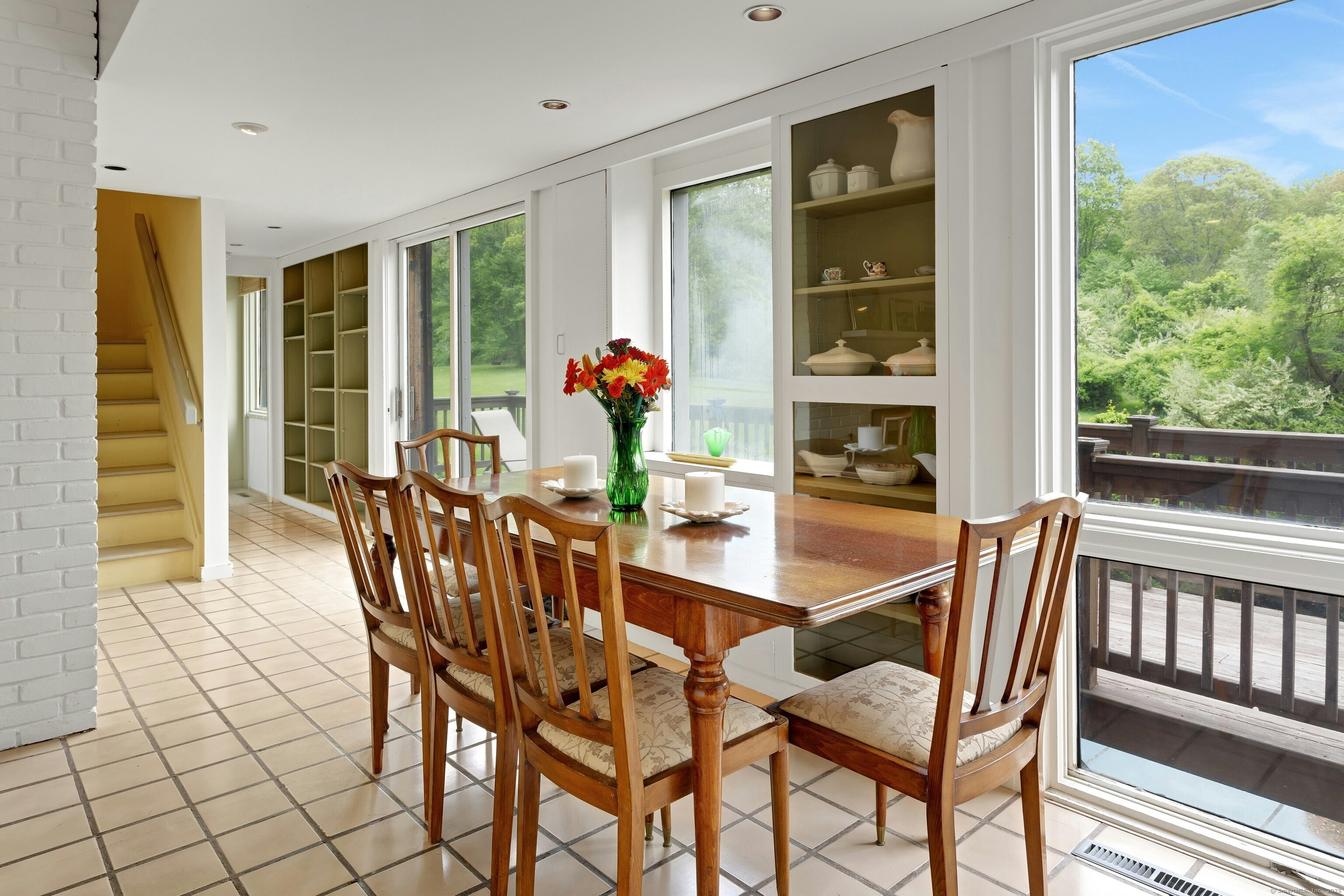 32 Beeholm Road Redding, CT 06896 - Photo 17 of 40 a dining room with furniture and window