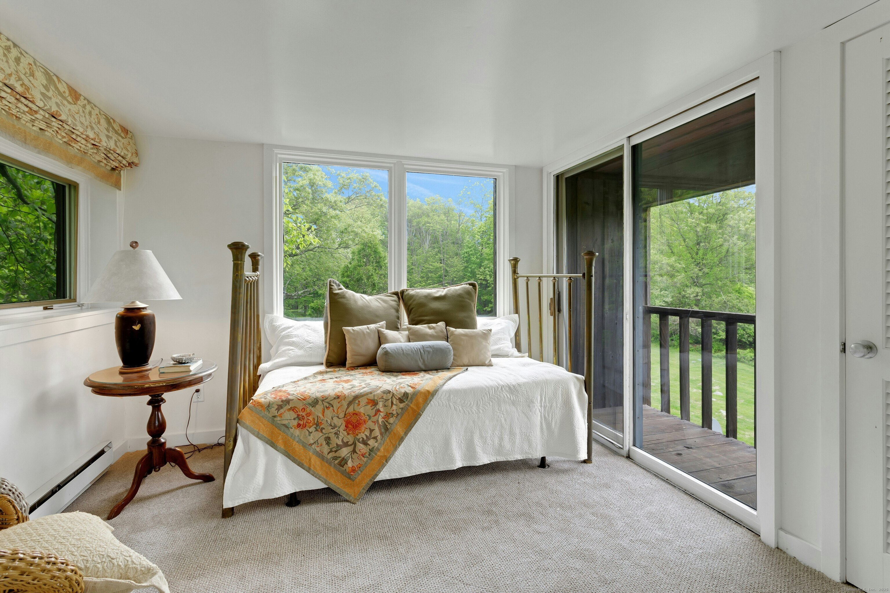 32 Beeholm Road Redding, CT 06896 - Photo 25 of 40 a bedroom with a bed and a large window