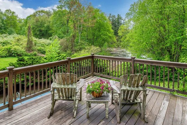 a view of balcony with furniture