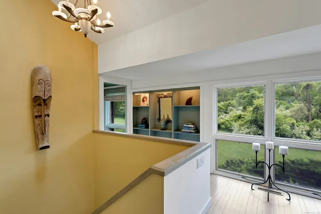 a view of a living room with a large window