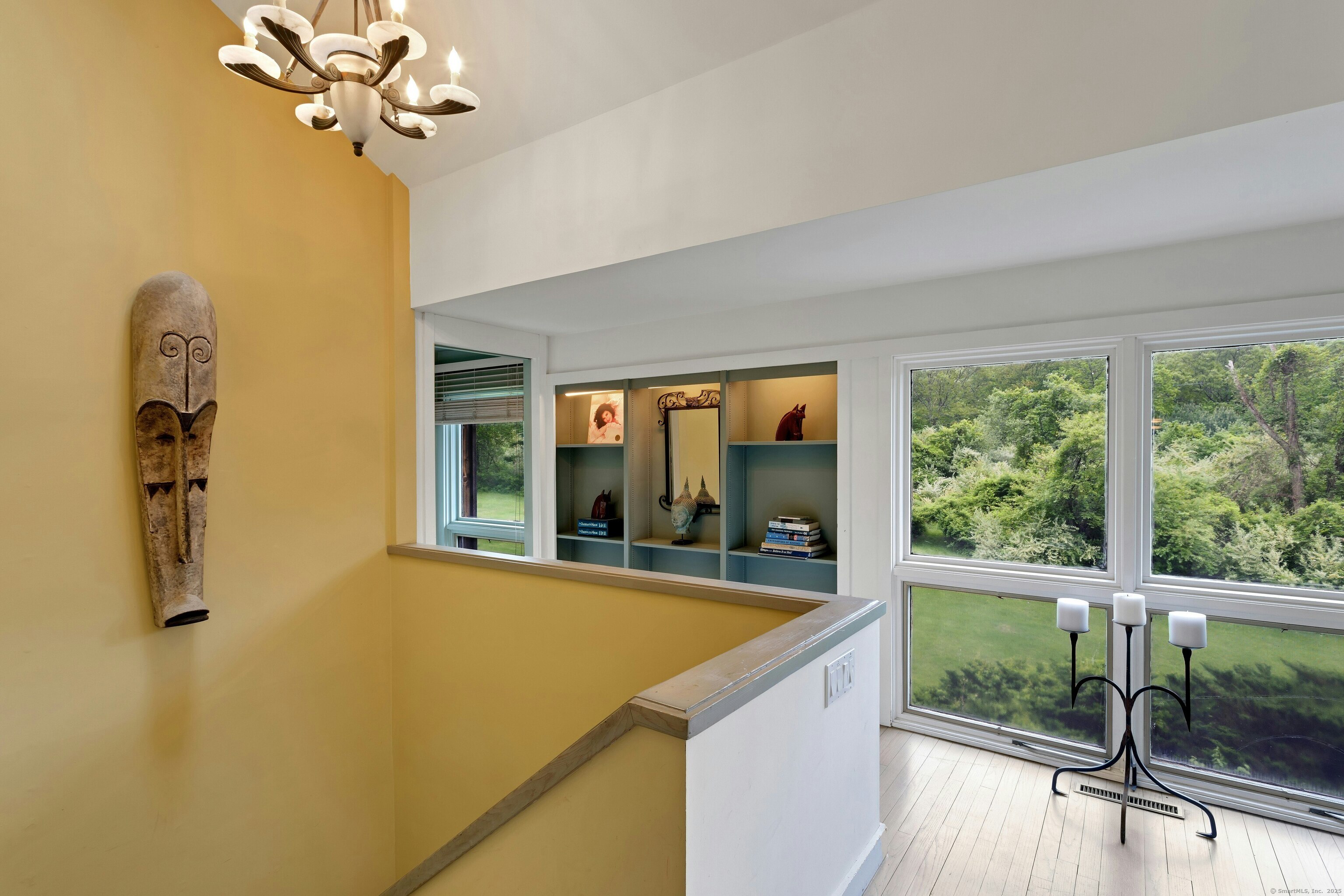 32 Beeholm Road Redding, CT 06896 - Photo 10 of 40 a view of a living room with a large window