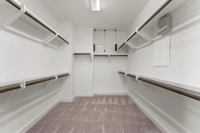 a view of an empty walk in closet