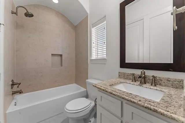 a view of a lake with building in front of it