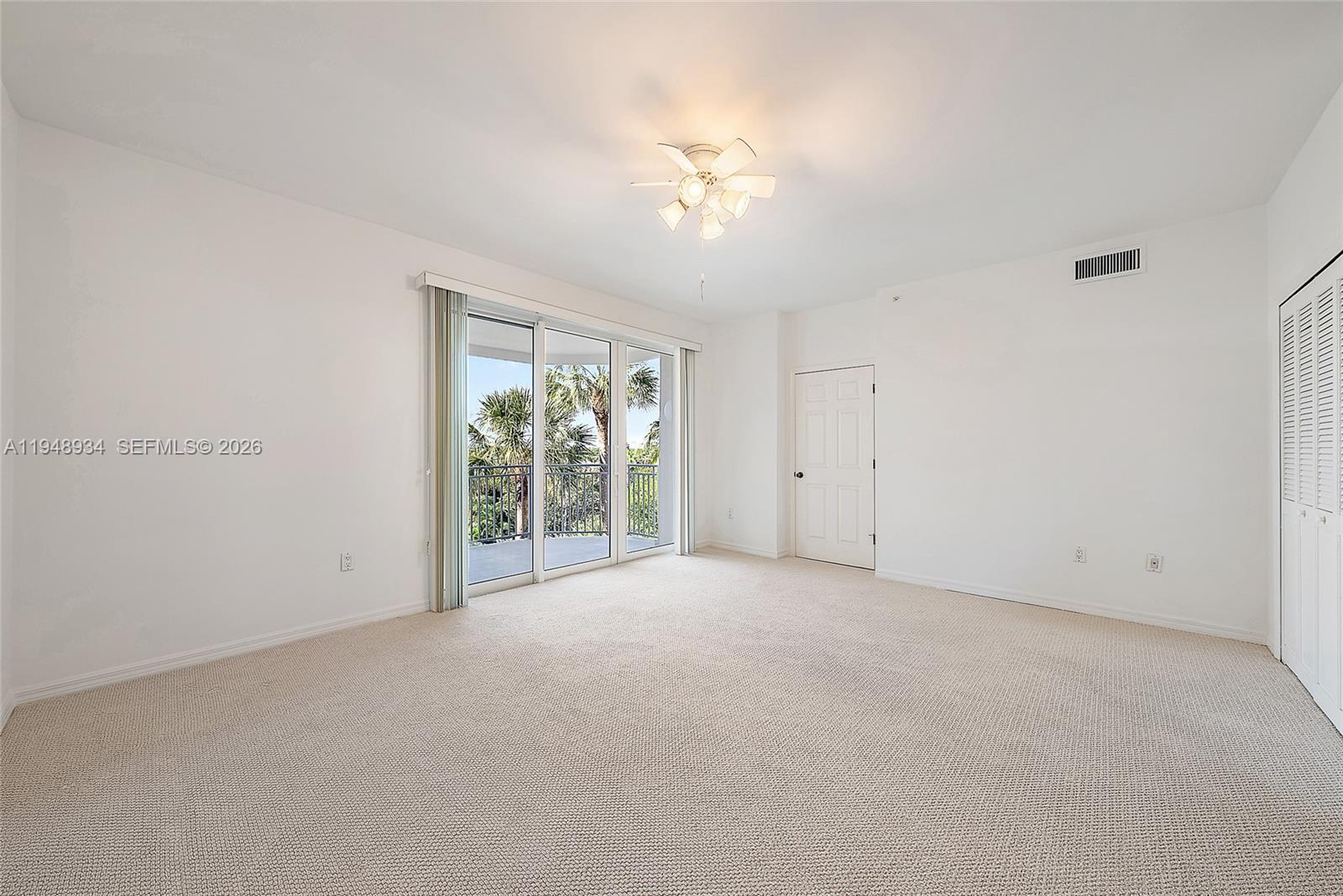 1660 Florida A1A, Unit 222 Jupiter, FL 33477 - Photo 19 of 34 a view of an empty room with a window