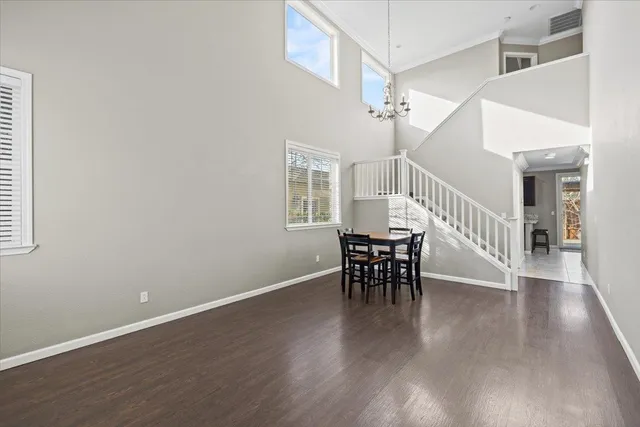 an aerial view of a house with a garden