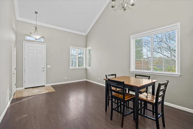an aerial view of swimming pool a yard and lake view