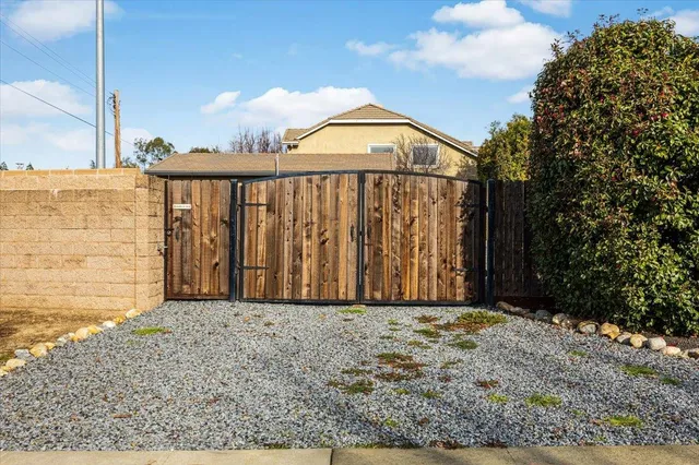 a view of kitchen with stainless steel appliances cabinets and a counter top space