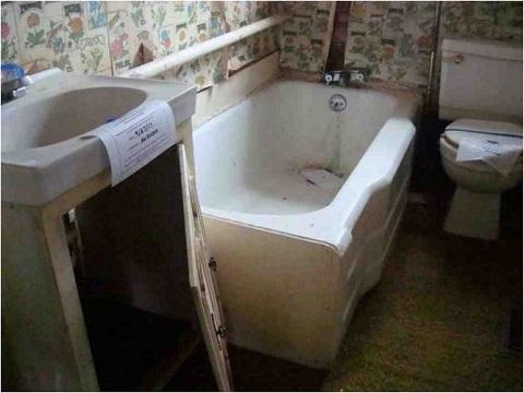 233 Page Road Monroe, VA 24574 - Photo 10 of 12 a bathroom with a bathtub and a sink