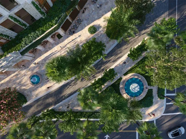 a view of pool with water fountain and trees