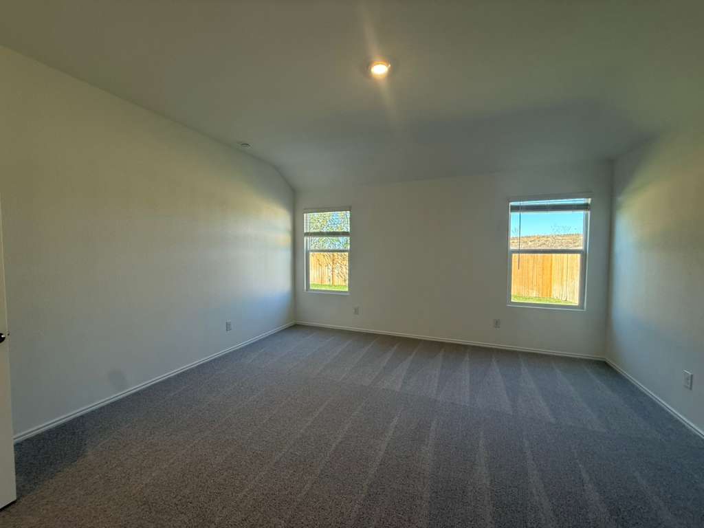 577 Sormonne Loop Kyle, TX 78640 - Photo 12 of 39 an empty room with a window