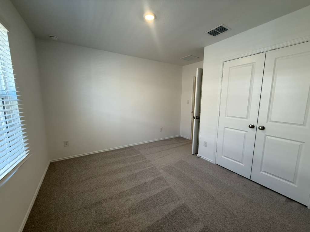 577 Sormonne Loop Kyle, TX 78640 - Photo 17 of 39 a view of an empty room