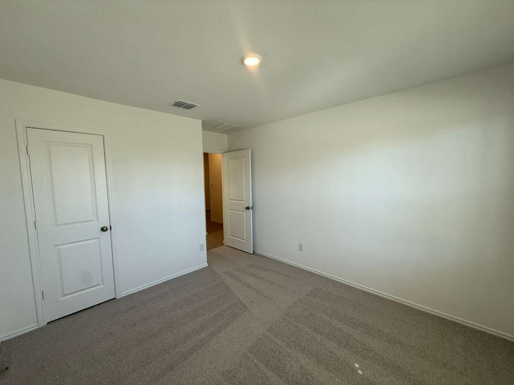 577 Sormonne Loop Kyle, TX 78640 - Photo 22 of 39 a view of an empty room
