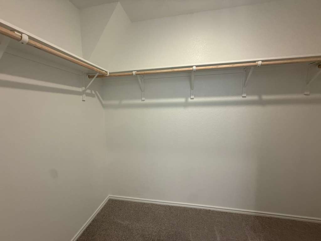 577 Sormonne Loop Kyle, TX 78640 - Photo 30 of 39 a view of an empty walk in closet