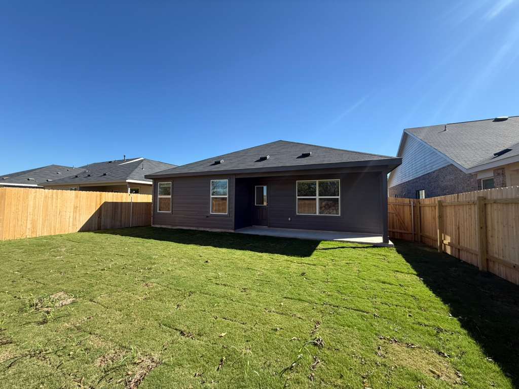 577 Sormonne Loop Kyle, TX 78640 - Photo 32 of 39 a view of a house with a yard