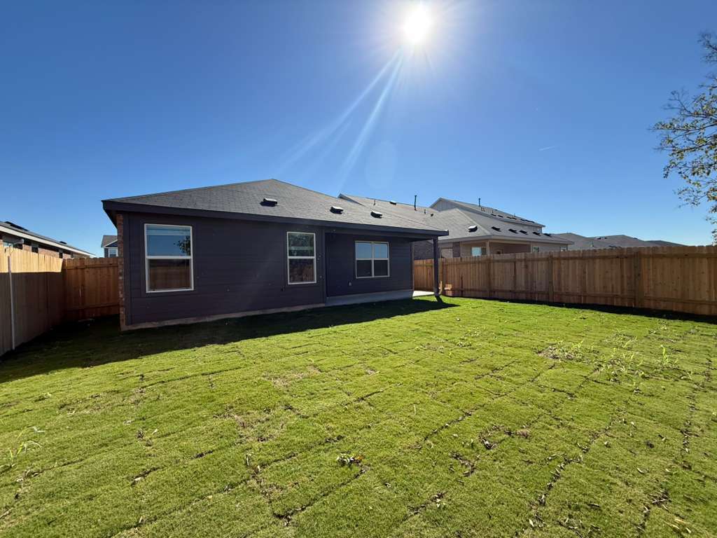 577 Sormonne Loop Kyle, TX 78640 - Photo 33 of 39 a view of a house with backyard