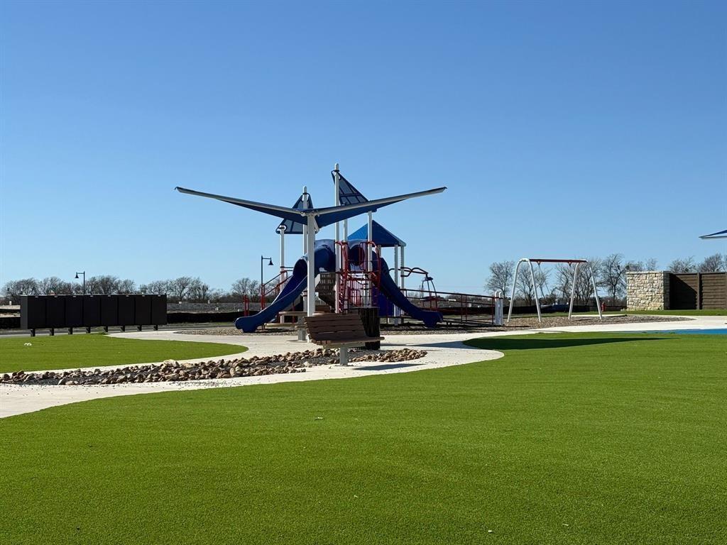 577 Sormonne Loop Kyle, TX 78640 - Photo 37 of 39 a view of a house with a swimming pool