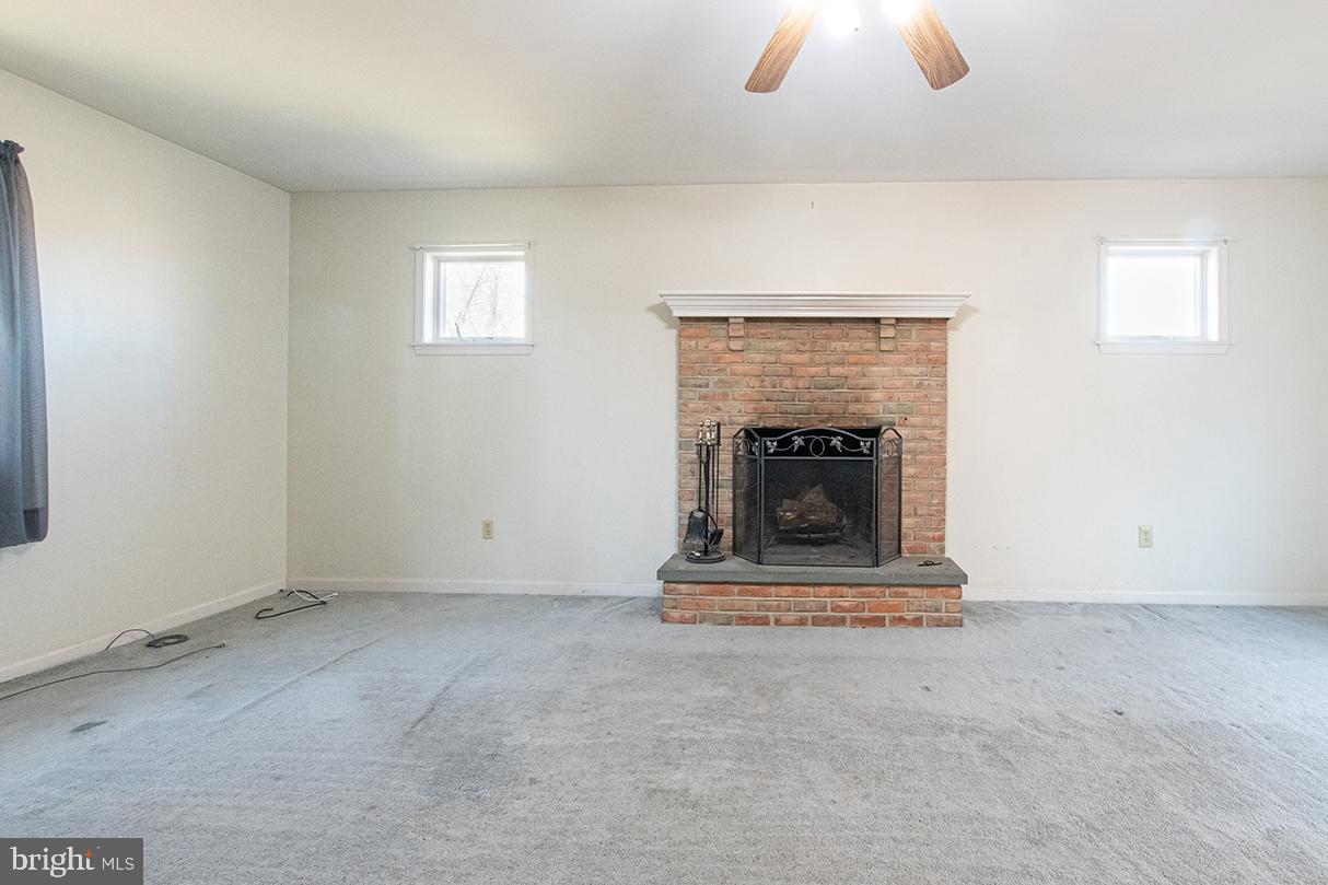 219 Dowlin Forge Road Exton, PA 19341 - Photo 24 of 34 Brick fireplace