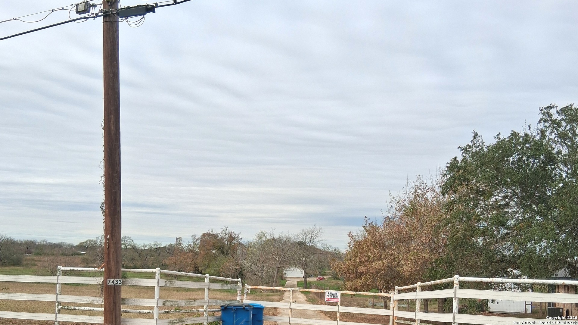 7431-7433 Real Road China Grove, TX 78263 - Photo 2 of 17 a view of a city from a terrace