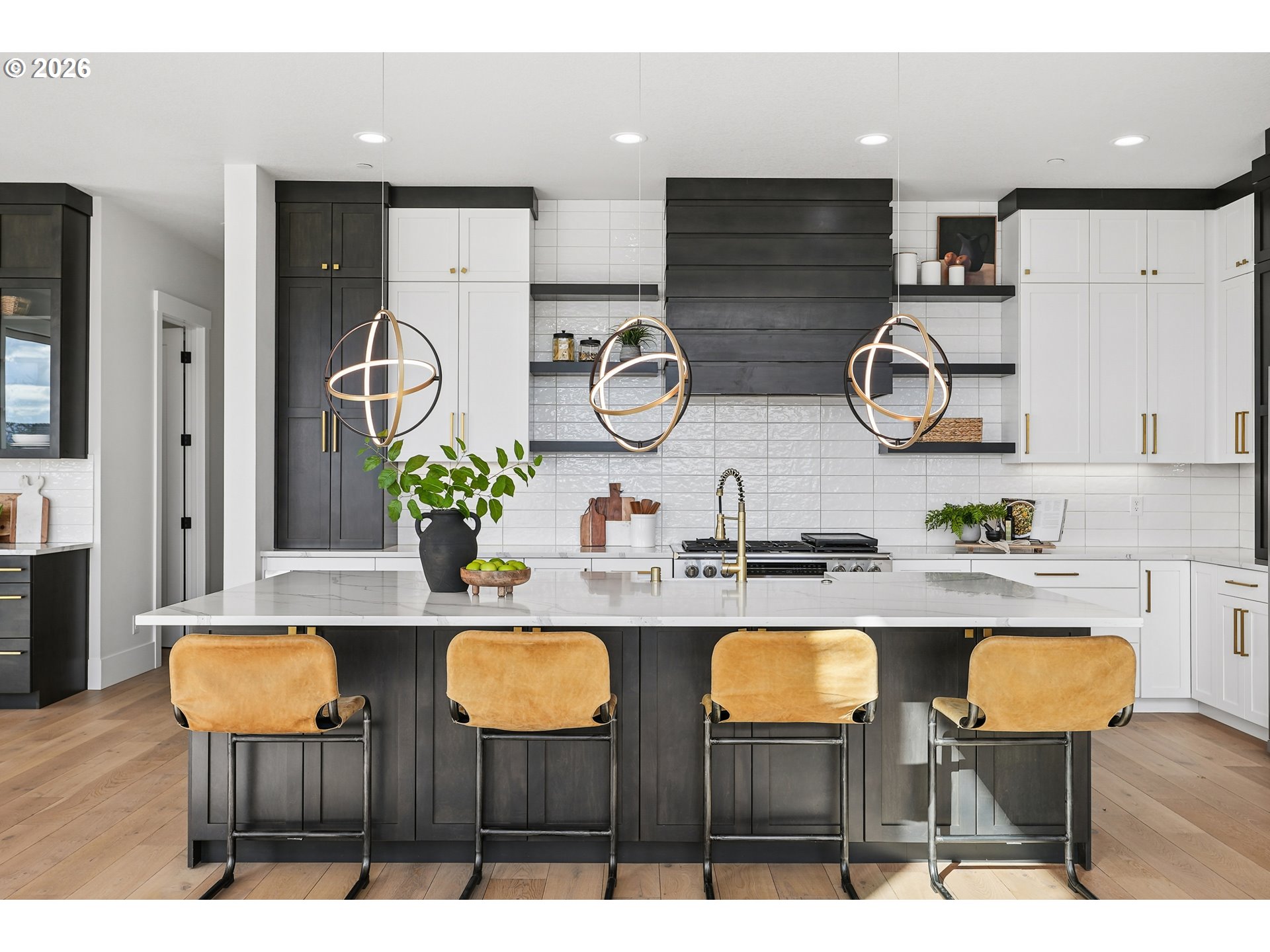 1757 North Columbia Ridge Way Washougal, WA 98671 - Photo 13 of 48 a kitchen with cabinets and chairs